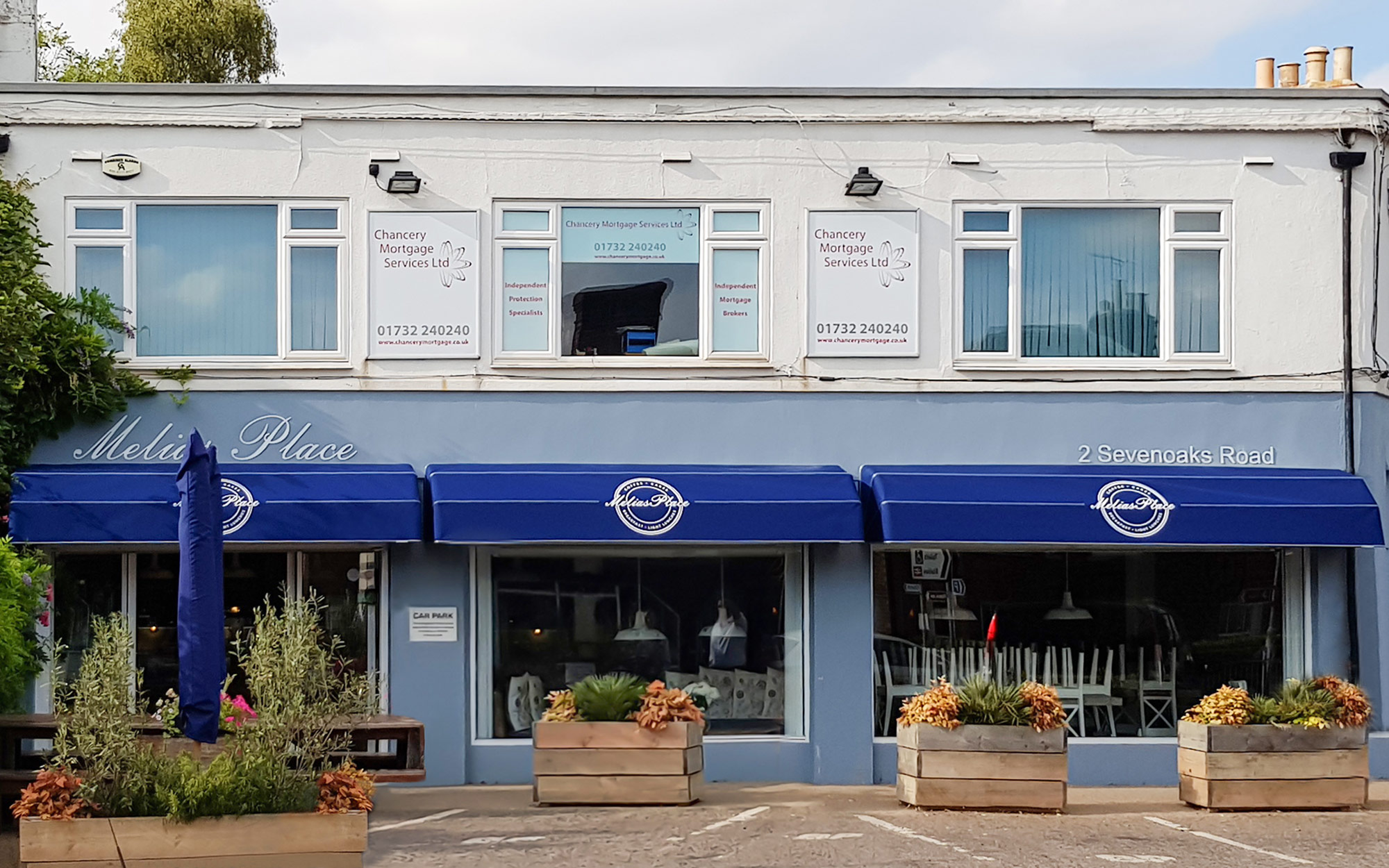 Blue Canopies by Commercial Awning Company