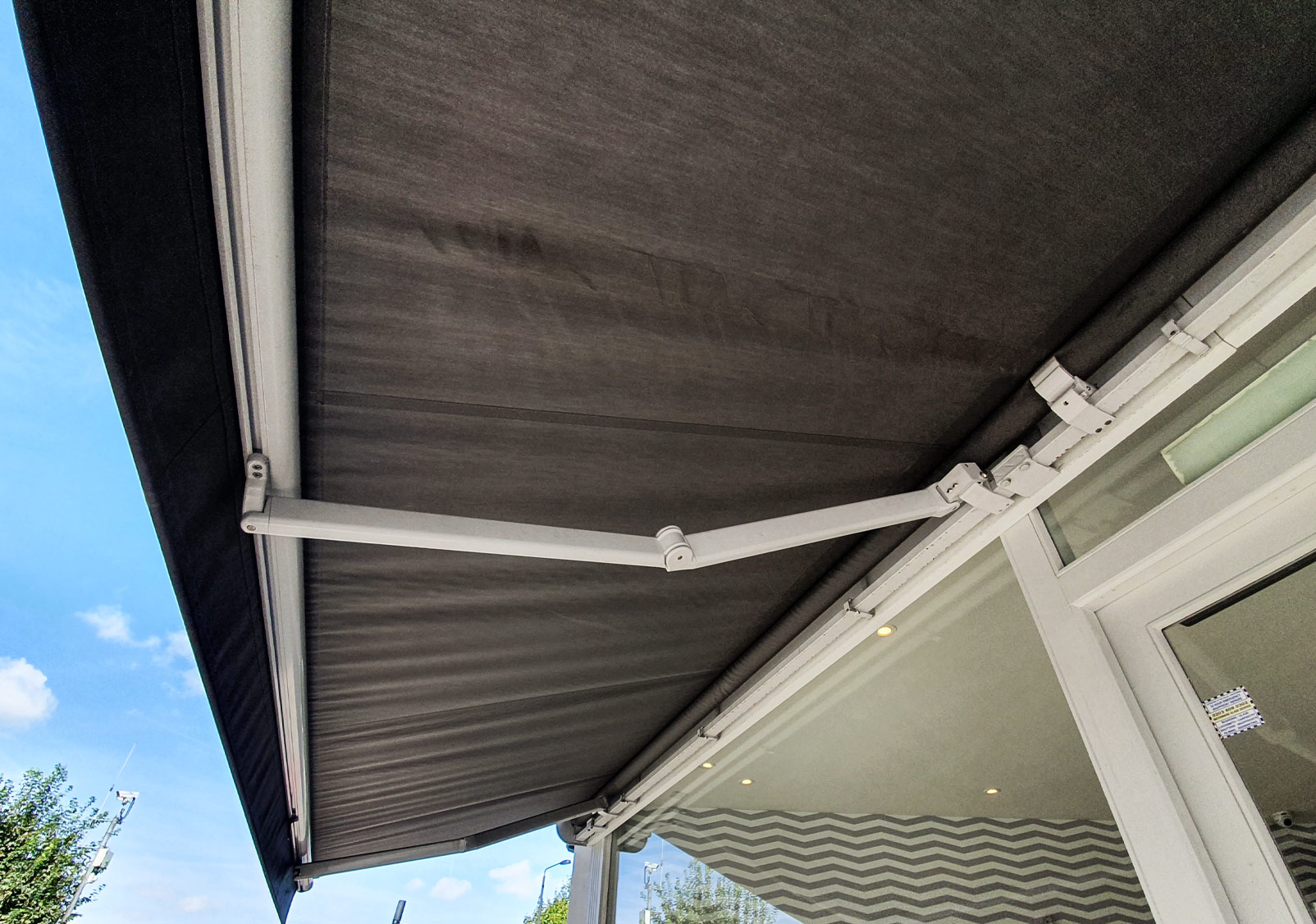 Commercial folding arm awning detail