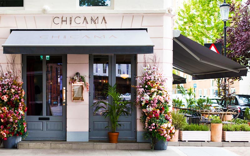 Folding arm restaurant awning